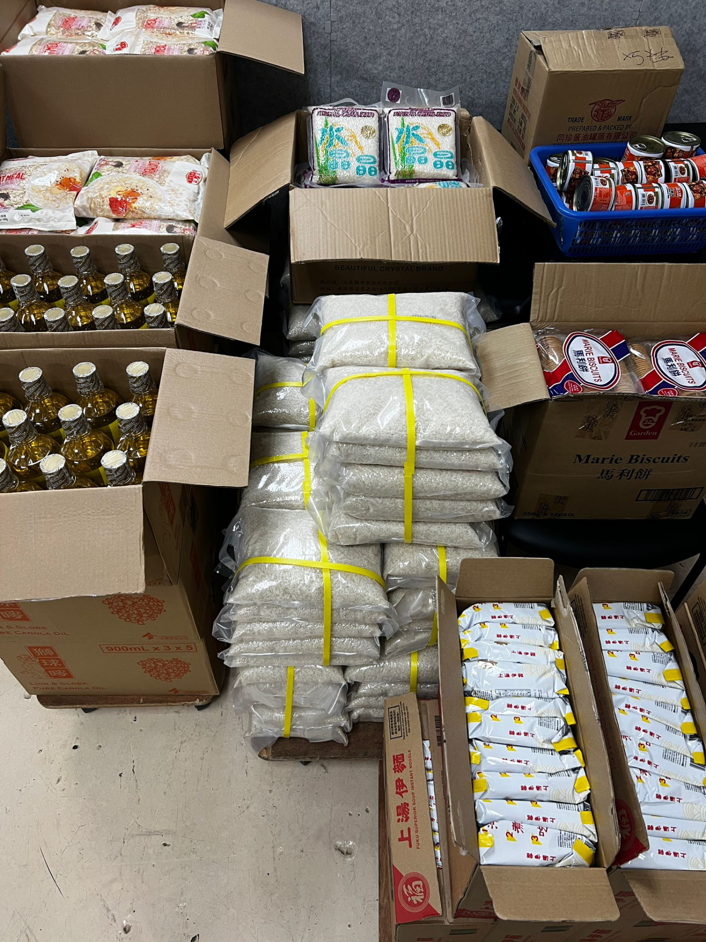 Store room stacked with rice, oil and instant noodles